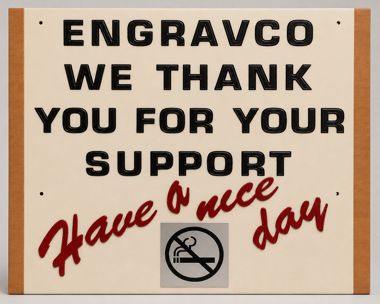 Board with cut-out lettering reading Engravco, we thank you for your support